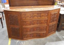 An Eastern carved hardwood side cupboard, with overall decoration,