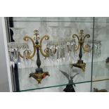 A pair of Regency style bronze and cut-glass lustre candelabra