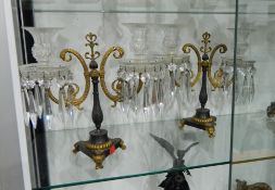 A pair of Regency style bronze and cut-glass lustre candelabra