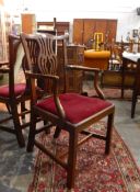 A pair of Chippendale style mahogany open armchairs, with pierced splat back,