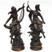 A pair of 19th century French bronzed-effect spelter figures of maidens depicting the arts,