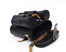 A pair of Helios binoculars in leather case