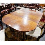 A 19th century mahogany drop-leaf dining table,