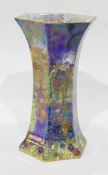 A Wilton ware lustre vase of hexagonal form, decorated with landscapes,