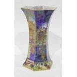 A Wilton ware lustre vase of hexagonal form, decorated with landscapes,