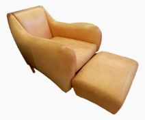 A Balzac armchair and footstool in tan leather,