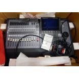 A Roland 24 bit digital studio workstation VS-1880 in its original box, a Stealth plug,