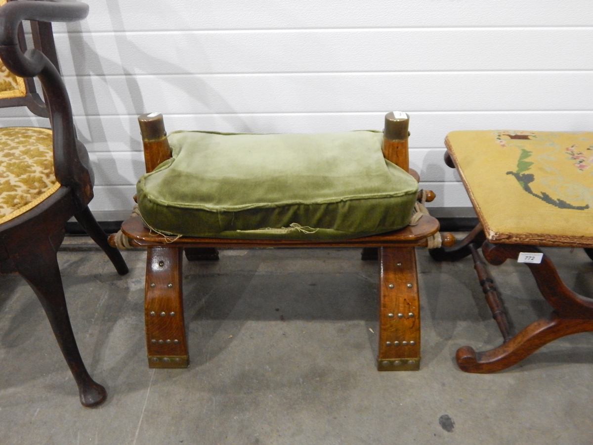 An old wooden camel saddle stool,