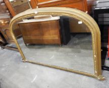 A Victorian overmantel mirror in gilt moulded frame,