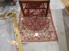 A pair of Persian style runners with red ground,