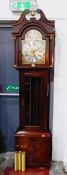 A reproduction mahogany longcase clock, the hood with swan neck pediment,