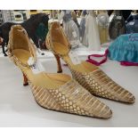 A pair of snakeskin heels from the Bangkok Beauterie, size 8.