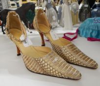 A pair of snakeskin heels from the Bangkok Beauterie, size 8.