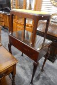 An oak canteen table fitted with two drawers, on cabriole legs,