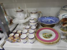 A Shelley coffee set comprising six coffee cans and saucers, tea pot, milk and sugar,