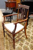 An Edwardian mahogany and satinwood inlaid open armchair, with open splat back, upholstered seat,