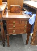 An early twentieth century mahogany folding envelope top card table, lined with baize,