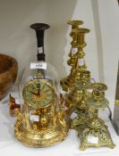 A pair of Victorian brass candlesticks, another pair of foliate form, an old telescopic candlestick,