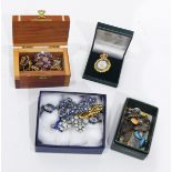 A quantity of costume jewellery and enamel badges