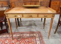 An early 19th century mahogany washstand with three-quarter gallery and fitted three small frieze