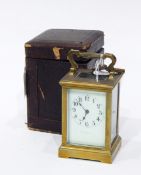 A brass carriage timepiece in corniche type case,