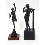 A bronze model of a standing female figure on integral square base,