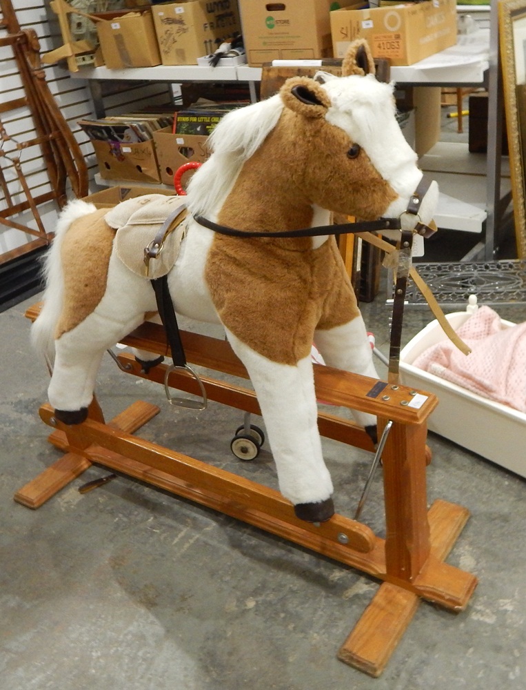 A Mulholland and Baillie plush bodied rocking horse on fine cruciform stretcher