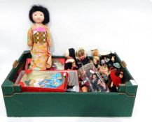 A quantity of souvenir dolls including one dressed as a Geisha, one in Dutch costume, etc.