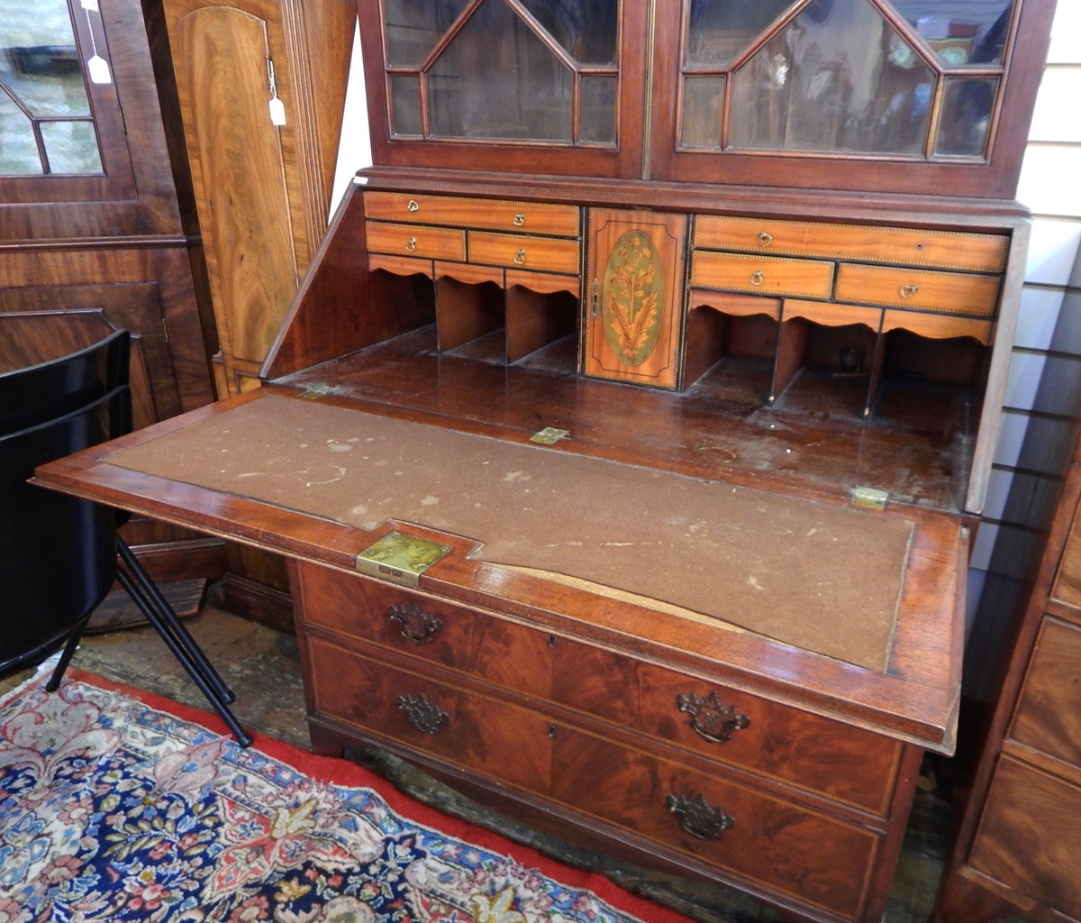 Georgian flame mahogany bureau bookcase, the top with swan neck pediment, urn and swag inlay, - Image 2 of 2