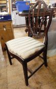 Set of three Sheraton-style mahogany shield-back dining chairs with serpentine fronted seats and