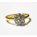 18ct gold and diamond flowerhead cluster ring set with six brilliant cut diamonds surrounding a