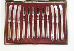 Set of six pairs of silver handled tea knives and forks