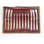 Set of six pairs of silver handled tea knives and forks