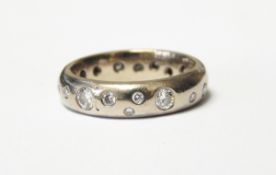 18ct white gold and diamond ring by Sarah Jones,