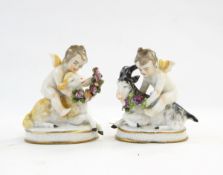 Pair Staffordshire china groups of cherubs with sheep, on rounded oblong bases, 7.