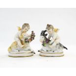 Pair Staffordshire china groups of cherubs with sheep, on rounded oblong bases, 7.