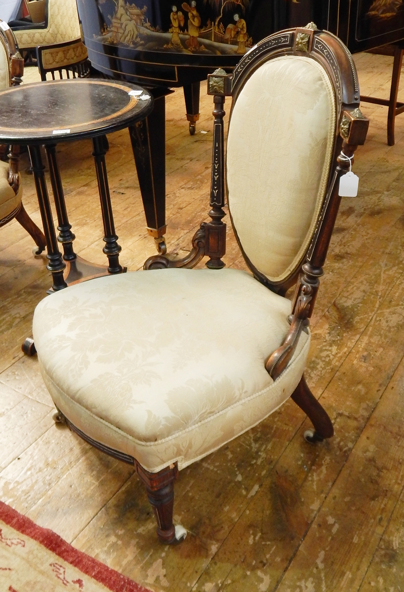 Late 19th/early 20th century mahogany drawing room chair with oval back flanked by two tapering