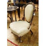 Late 19th/early 20th century mahogany drawing room chair with oval back flanked by two tapering