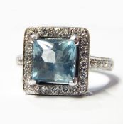 18ct white gold aquamarine and diamond ring, set square cushion cut aquamarine claw set (approx.