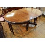 Early 20th century oval extending dining table with three extra leaves,