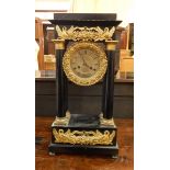 Continental four-pillar ormolu mounted and ebonised mantel clock with foliate and swan