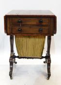 Early 19th century rosewood sewing table with two short drawers to reveal writing slope,