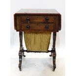 Early 19th century rosewood sewing table with two short drawers to reveal writing slope,