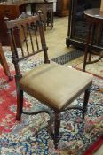 Set of four Victorian Aesthetic Movement mahogany dining chairs each with turned finials and scroll