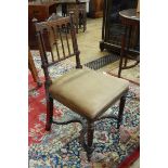 Set of four Victorian Aesthetic Movement mahogany dining chairs each with turned finials and scroll