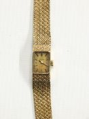 Lady's 9ct gold Omega bracelet watch with square dial,