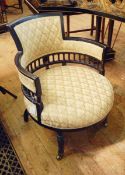 Ebonised occasional chair with shaped back and spindle back decoration, gold-coloured fabric seat,