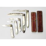 Georgian silver folding fruit knife with engraved mother-of-pearl handle (crack to handle),