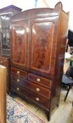 Georgian mahogany inlaid linen press with broken-arch shaped pediment, stringing and floral inlay,