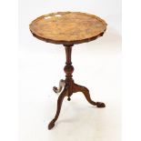 Burr walnut piecrust topped wine table on single reeded and bulbous support with carved cabriole